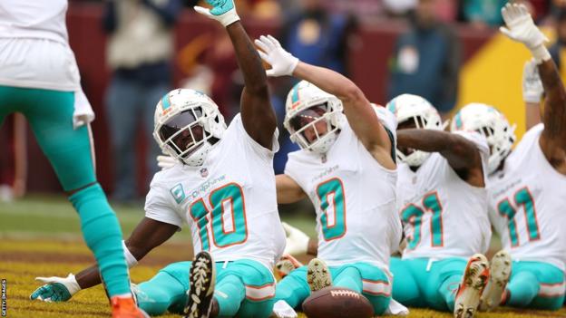 Tyreek Hill celebrates a Miami Dolphins touchdown