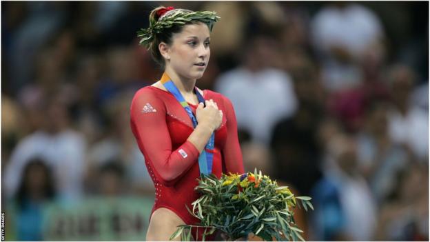 Carly Patterson receives the all-around gold medal at the 2004 Olympics in Athens