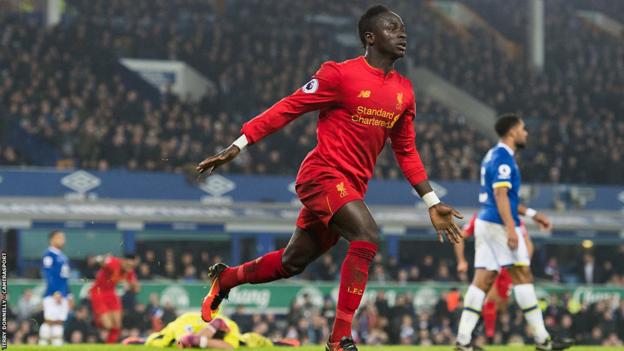 Sadio Mane celebrates scoring for Liverpool